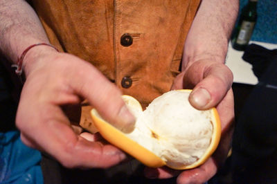 Close-up of man preparing food