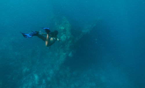 Woman snorkeling in sea