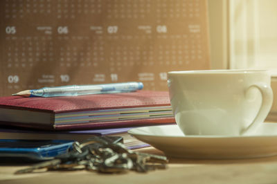 Close-up of coffee cup on table