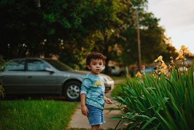 Boy standing on field