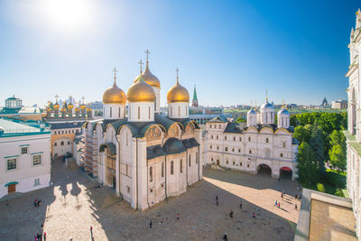 Panoramic view of buildings in city against sky