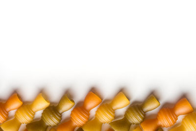 Close-up of wicker basket on white background