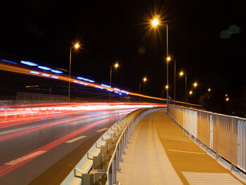 Light trails on road at night