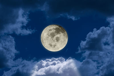 Low angle view of moon against sky