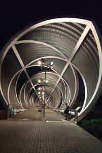 Illuminated tunnel. puente monumental de arganzuela, madrid.