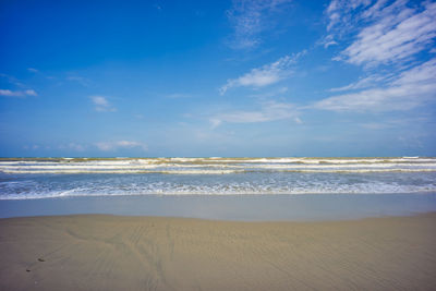 Scenic view of beach against sky