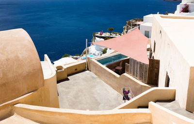 View of buildings by sea