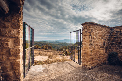 Exterior of abandoned building against sky