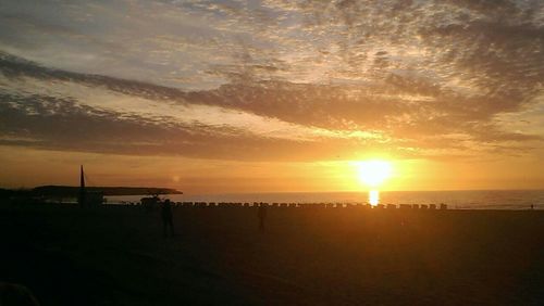 Scenic view of sea at sunset