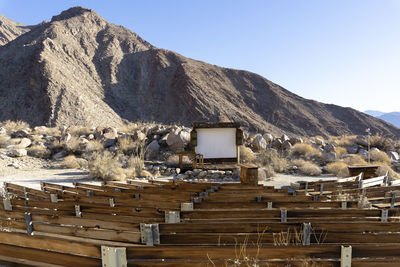 Palm canyon campground amphitheater in anza borrego state park. wooden seating and stage