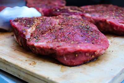 Close-up of meat on cutting board