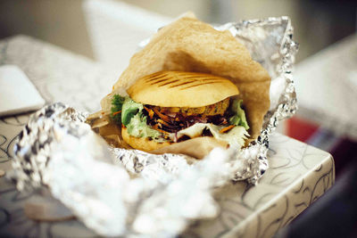 Close-up of burger on table