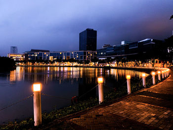 Illuminated buildings at waterfront