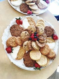 High angle view of cookies in plate on table