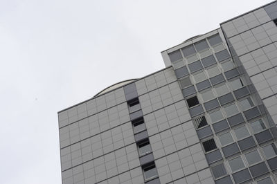 Low angle view of modern building against clear sky