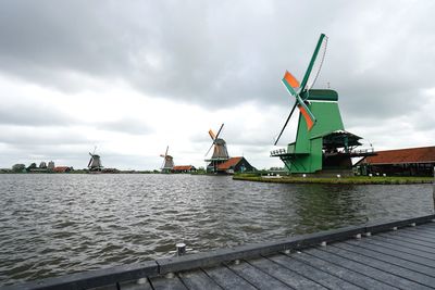 Traditional windmill against sky