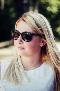 Young woman wearing sunglasses outdoors