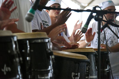 Low angle view of man playing piano