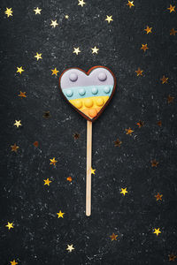 High angle view of heart shape on road