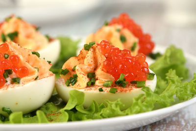 Stuffed eggs with salmon caviar are a popular appetizer for any occasion. 