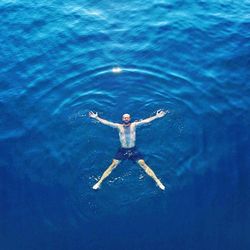 High angle view of person swimming in sea