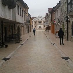 Woman walking on city street