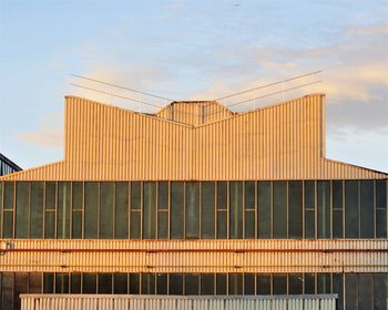 Low angle view of building against sky during sunset