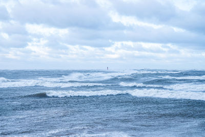 Thunder storm waves crashing on the beach