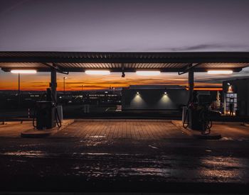 Illuminated railroad station at night