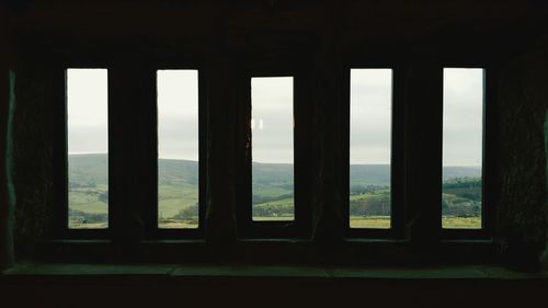 View of sea through window