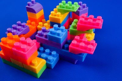 Close-up of toy blocks on blue background