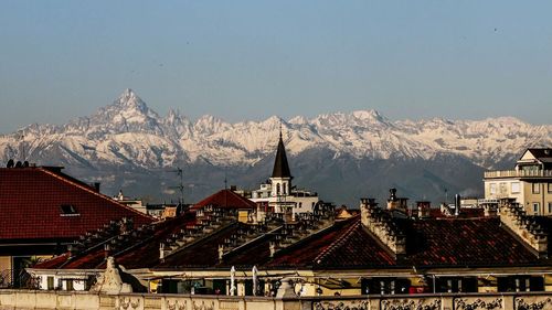 Cityscape against sky during winter