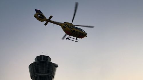 Low angle view of airplane against clear sky