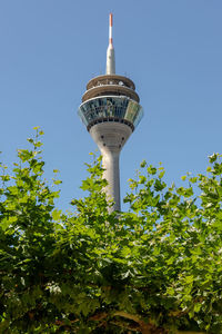 Low angle view of building against clear blue sky