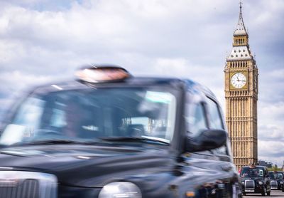 View of clock tower against cloudy sky