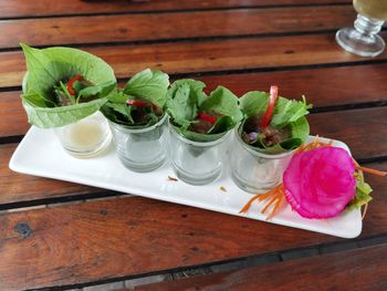 High angle view of fruits in plate on table