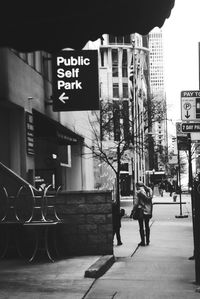 Sign on sidewalk