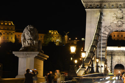 Low angle view of statue at night