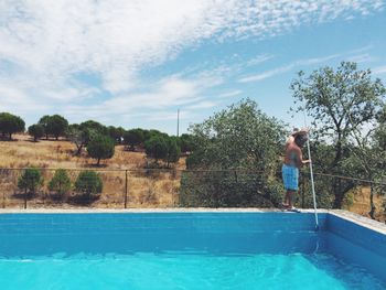 Swimming pool against blue sky