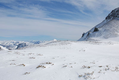 Scenic view of snow in puerto san isidro against sky