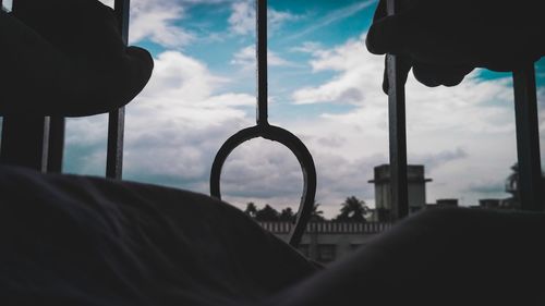 Close-up of motorcycle against sky