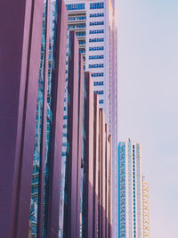 Low angle view of skyscrapers against sky