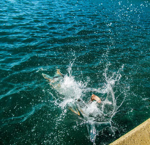 Man swimming in sea