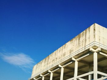 Low angle view of building against blue sky