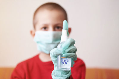 Portrait of boy holding ice cream