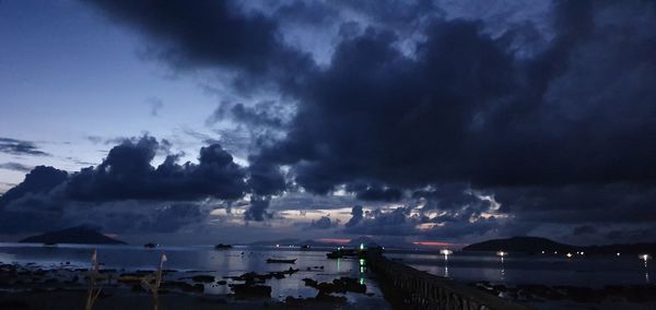 Panoramic view of sea against sky at night