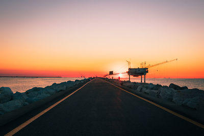 Marina di ravenna, ravenna / italy - august 2020. molo zaccagnini during the sunrise