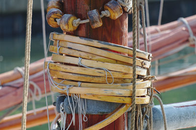 Close-up of rope tied to bollard