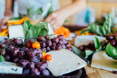 Close-up of red grapes on table