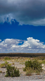 Scenic view of land against sky